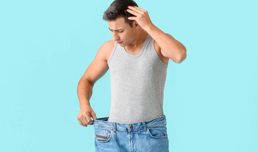 Man with sudden weight loss problem on color background