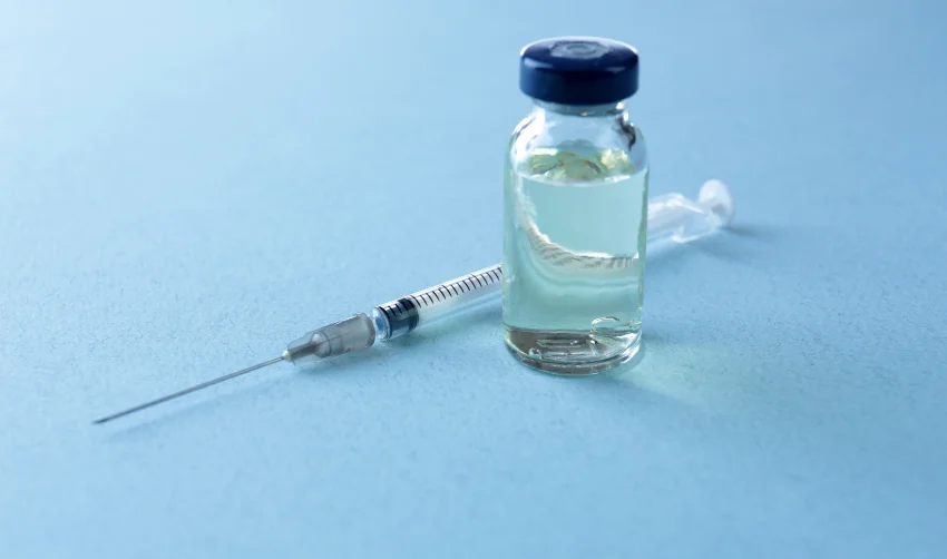 Vaccine in Vial with Syringe