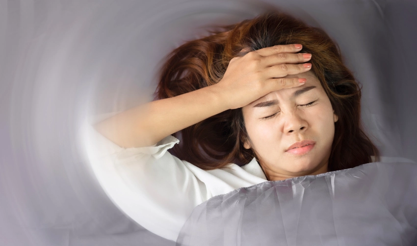 Unwell Asian woman having dizziness